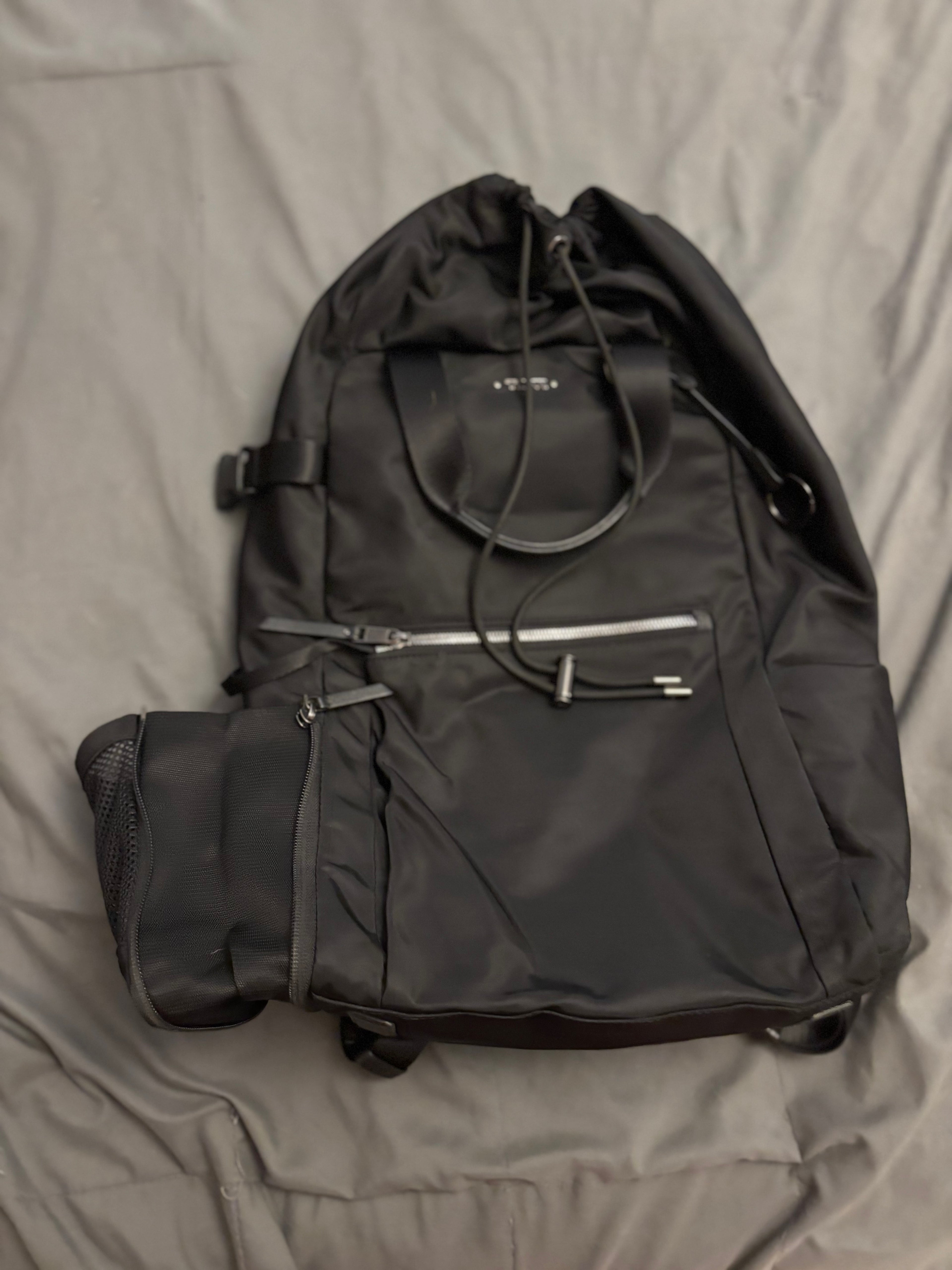 TUMI Voyageur Fern Drawstring Backpack – Black Nylon Luxury Travel Backpack